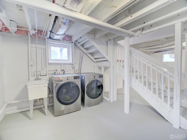 laundry area with separate washer and dryer