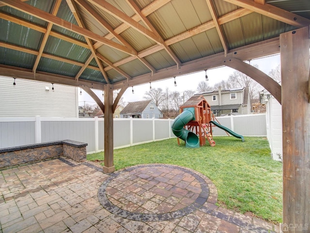 view of patio with a gazebo and a playground