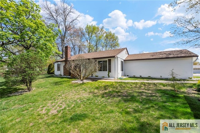 265 Crosse Dr Unit 265A, Monroe, NJ 08831 - view of front of home featuring a chimney and a front yard