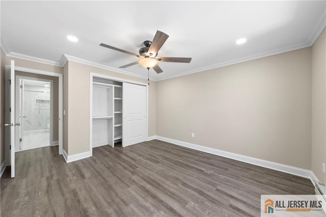 265 Crosse Dr Unit 265A, Monroe, NJ 08831 - unfurnished bedroom with baseboards, dark wood finished floors, a closet, recessed lighting, and crown molding