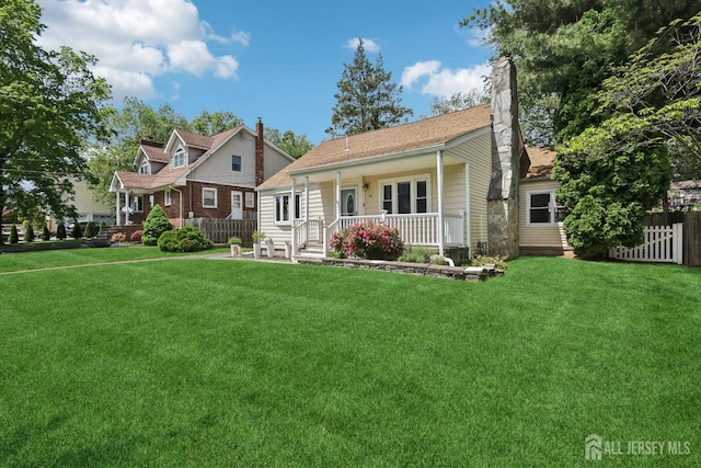 54 Morningside Rd, Colonia, NJ 07067 - view of front facade with covered porch and a chimney
