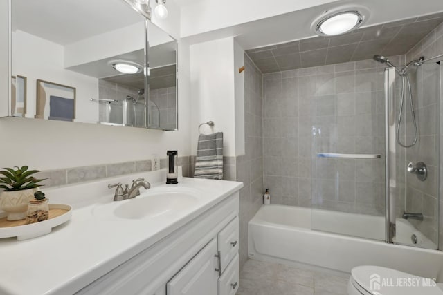54 Morningside Rd, Colonia, NJ 07067 - bathroom featuring vanity, tile patterned floors, toilet, and  shower combination