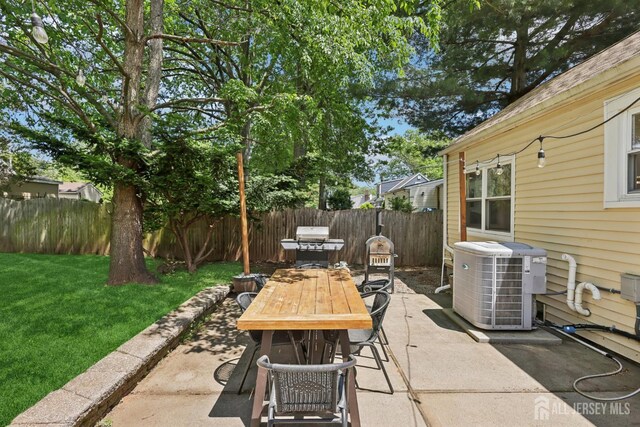 54 Morningside Rd, Colonia, NJ 07067 - view of patio with central air condition unit, outdoor dining area, and grilling area