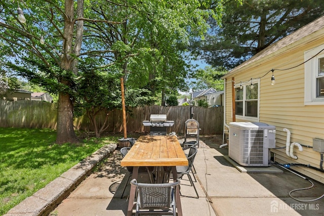 54 Morningside Rd, Colonia, NJ 07067 - view of patio featuring central air condition unit, outdoor dining space, and a grill