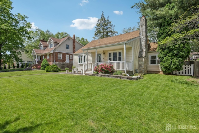 54 Morningside Rd, Colonia, NJ 07067 - view of front of home featuring a porch and a chimney