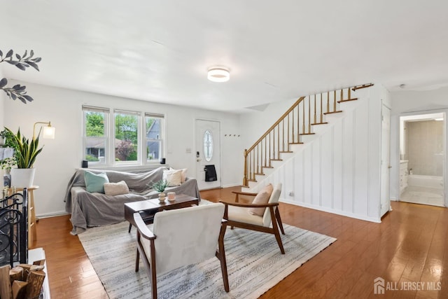54 Morningside Rd, Colonia, NJ 07067 - living room featuring stairs, hardwood / wood-style flooring, and baseboards