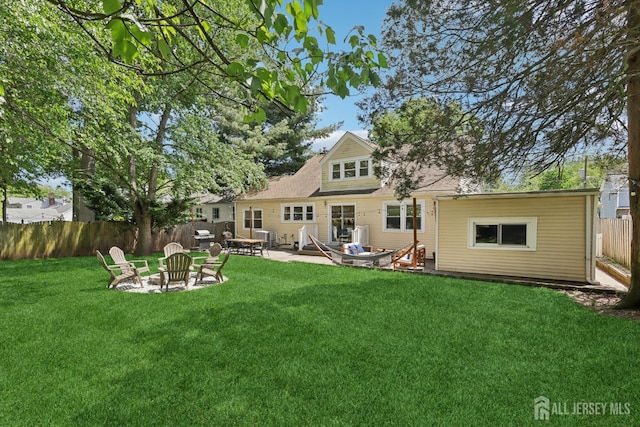 54 Morningside Rd, Colonia, NJ 07067 - rear view of house with a fire pit and a patio area