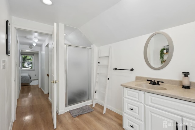 54 Morningside Rd, Colonia, NJ 07067 - full bathroom featuring a shower stall, vanity, wood finished floors, and lofted ceiling