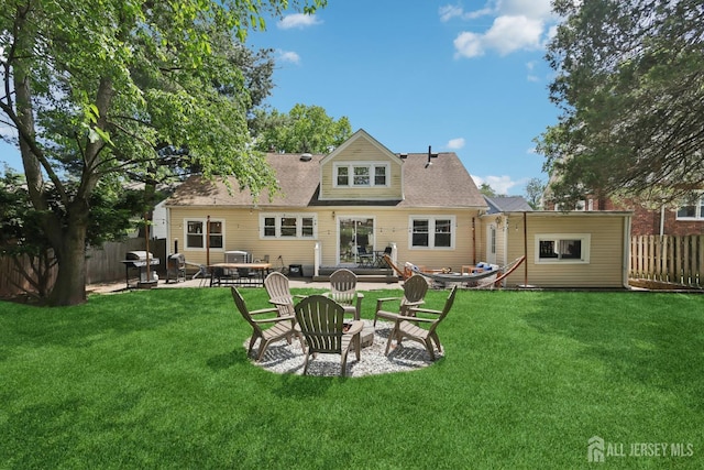 54 Morningside Rd, Colonia, NJ 07067 - back of house with an outdoor fire pit, a patio, and a shingled roof