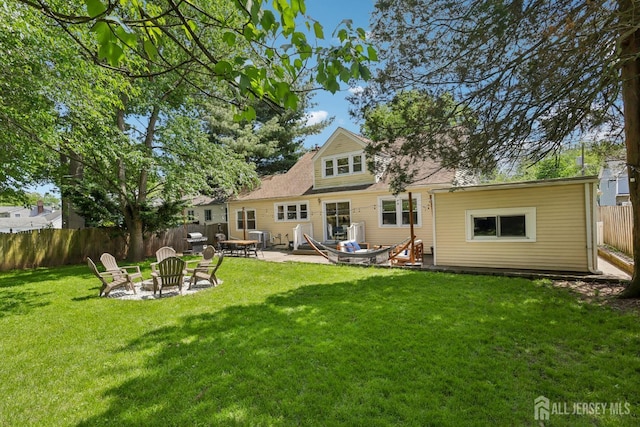54 Morningside Rd, Colonia, NJ 07067 - back of property with a fire pit and a patio