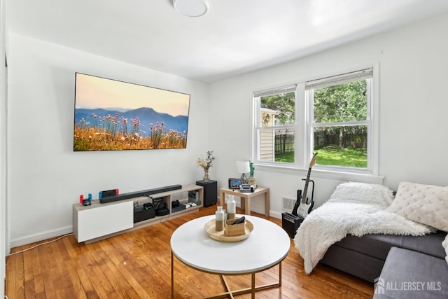 54 Morningside Rd, Colonia, NJ 07067 - living area with light wood-style floors and baseboards