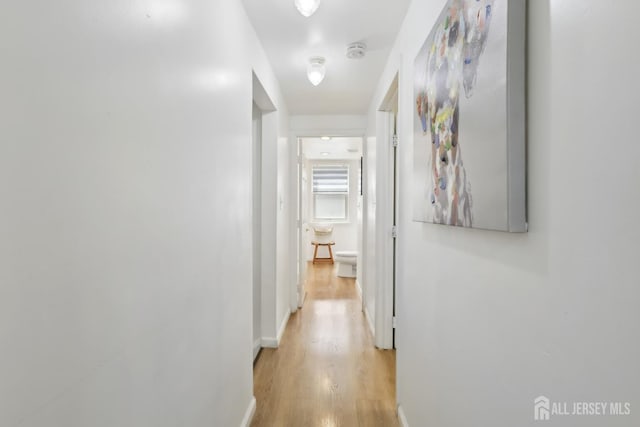 54 Morningside Rd, Colonia, NJ 07067 - hall featuring light wood finished floors and baseboards