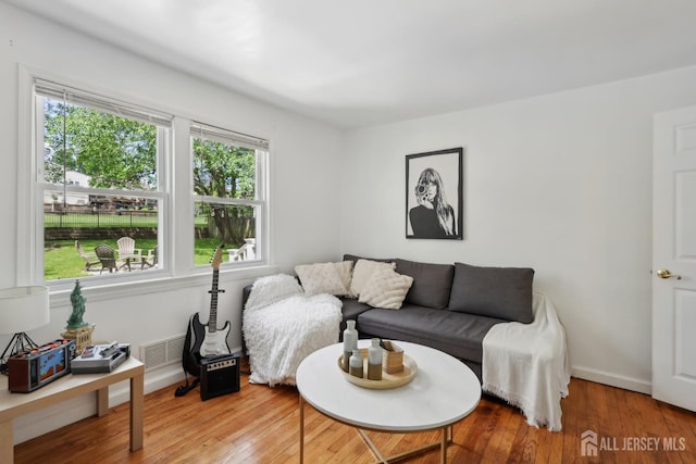 54 Morningside Rd, Colonia, NJ 07067 - living room with light wood-style flooring and baseboards