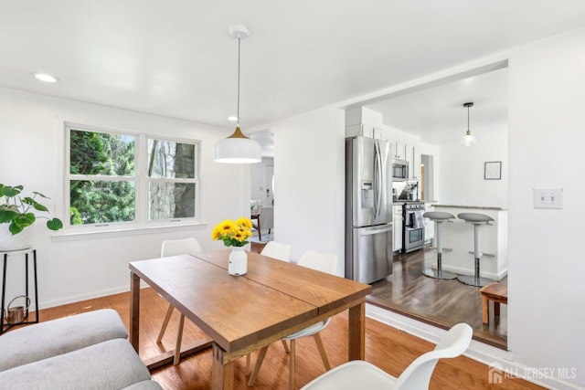 54 Morningside Rd, Colonia, NJ 07067 - dining area with wood finished floors, baseboards, and recessed lighting