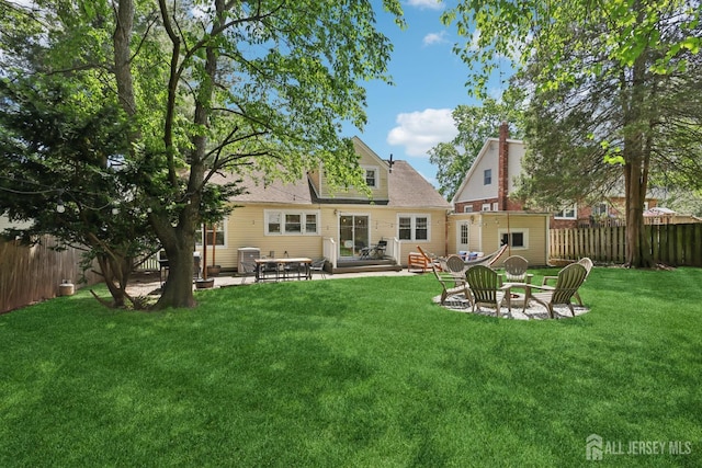 54 Morningside Rd, Colonia, NJ 07067 - back of house with a fire pit, a patio, and an outbuilding