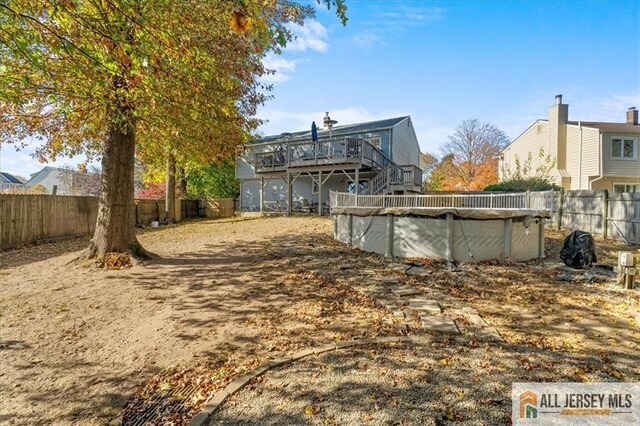 view of yard featuring a pool side deck