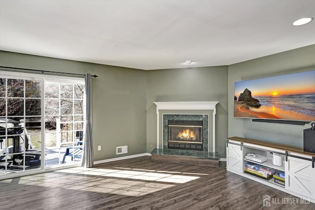 40 Forest Garden Dr, Old Bridge, NJ 07747 - unfurnished living room featuring dark wood finished floors, baseboards, a fireplace, and recessed lighting