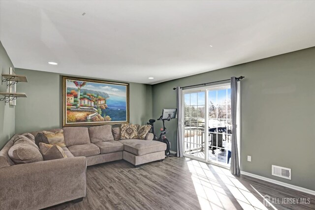 40 Forest Garden Dr, Old Bridge, NJ 07747 - living area with wood finished floors, recessed lighting, and baseboards
