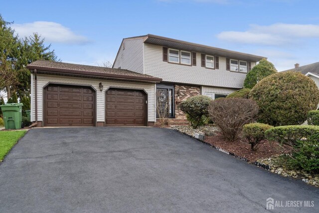 front of property featuring a garage