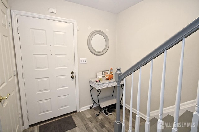 54 Highview Dr, Woodbridge Proper, NJ 07095 - entryway with dark wood-style flooring and baseboards