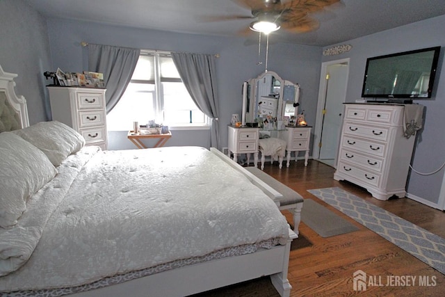 54 Highview Dr, Woodbridge Proper, NJ 07095 - bedroom with dark wood-style flooring and ceiling fan