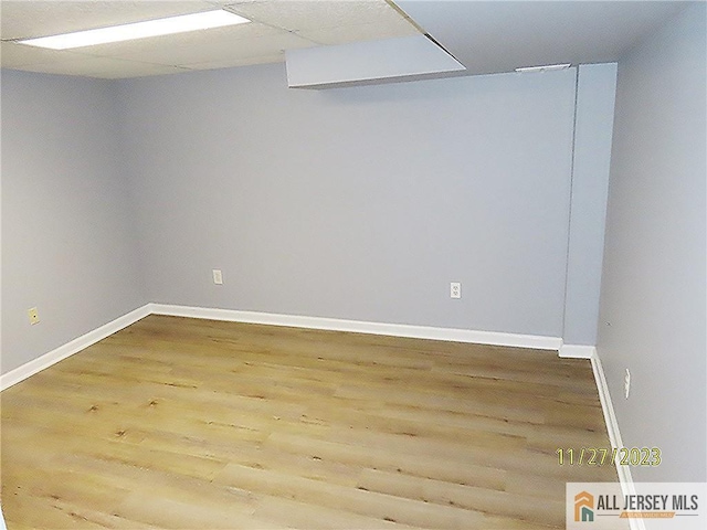 unfurnished room featuring hardwood / wood-style floors