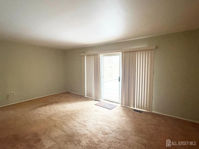 12 Excalibur Ct, Old Bridge, NJ 08857 - carpeted empty room featuring baseboards and visible vents