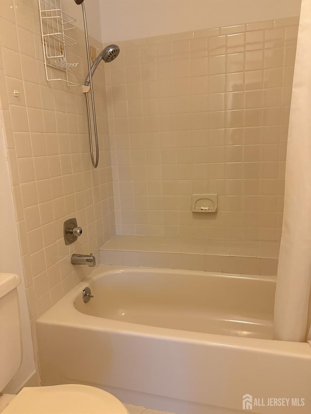 12 Excalibur Ct, Old Bridge, NJ 08857 - bathroom featuring shower / bathtub combination with curtain and toilet