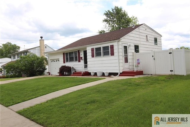 19 Wendy Dr, Old Bridge, NJ 08857 - single story home featuring an attached garage, a gate, driveway, and a shingled roof