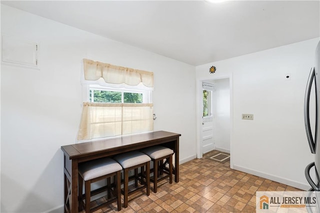 235 Brook Ave, North Plainfield, NJ 07060 - dining room with baseboards and brick patterned floors