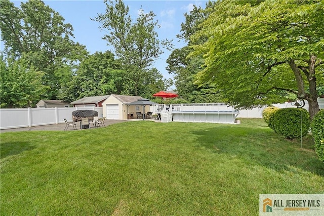 235 Brook Ave, North Plainfield, NJ 07060 - fenced backyard featuring a patio
