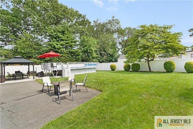 235 Brook Ave, North Plainfield, NJ 07060 - view of yard with a gazebo, a swimming pool, and a patio area