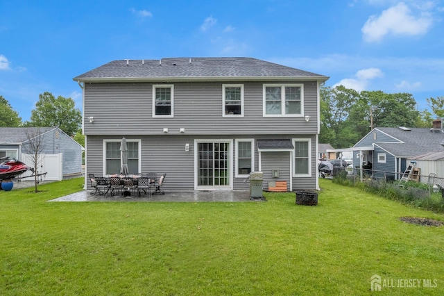 40 Cambridge Rd, Edison, NJ 08817 - rear view of house with a patio