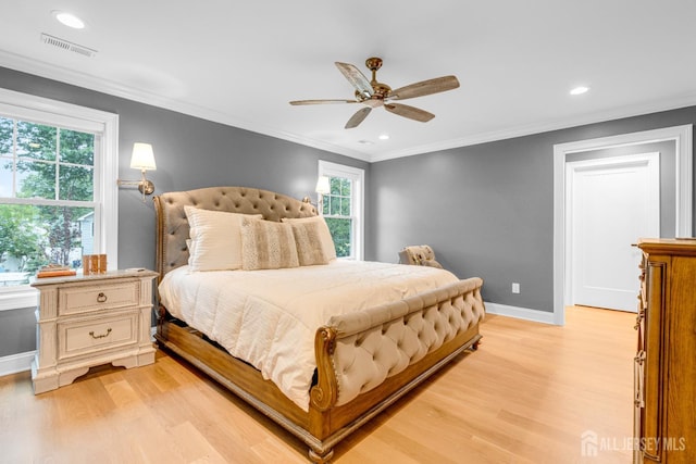 40 Cambridge Rd, Edison, NJ 08817 - bedroom featuring light wood-type flooring, multiple windows, baseboards, recessed lighting, and crown molding
