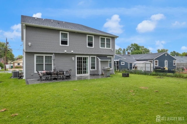 40 Cambridge Rd, Edison, NJ 08817 - rear view of house featuring cooling unit and a patio area