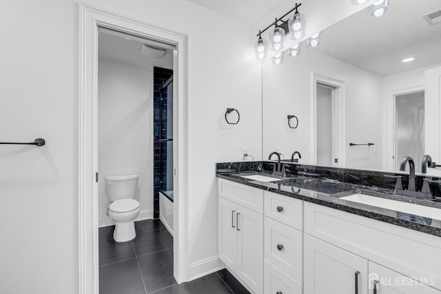 40 Cambridge Rd, Edison, NJ 08817 - full bathroom featuring double vanity, toilet, tile patterned flooring, shower / tub combination, and baseboards