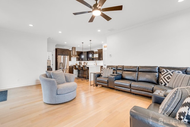 40 Cambridge Rd, Edison, NJ 08817 - living area featuring light wood-type flooring, a ceiling fan, recessed lighting, crown molding, and baseboards