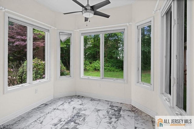124 Kingsland Cir S, Brunswick, NJ 08852 - unfurnished sunroom with marble look tile flooring and baseboards