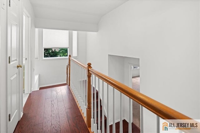 124 Kingsland Cir S, Brunswick, NJ 08852 - hall with an upstairs landing, wood finished floors, and lofted ceiling
