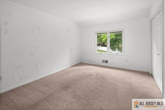 124 Kingsland Cir S, Brunswick, NJ 08852 - unfurnished bedroom with light carpet and a closet