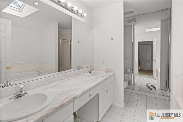 124 Kingsland Cir S, Brunswick, NJ 08852 - bathroom with a skylight, a bath, double vanity, and a shower stall