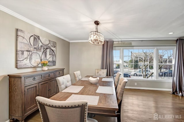 dining room with a chandelier and dark hardwood / wood-style flooring