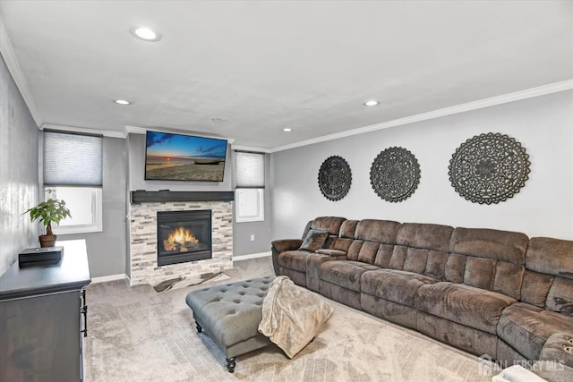 living room with ornamental molding, light carpet, and a stone fireplace