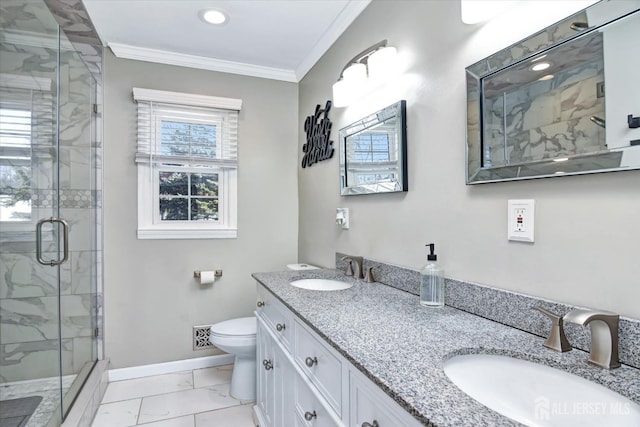 bathroom featuring crown molding, a shower with door, toilet, and vanity