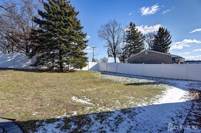 view of yard covered in snow