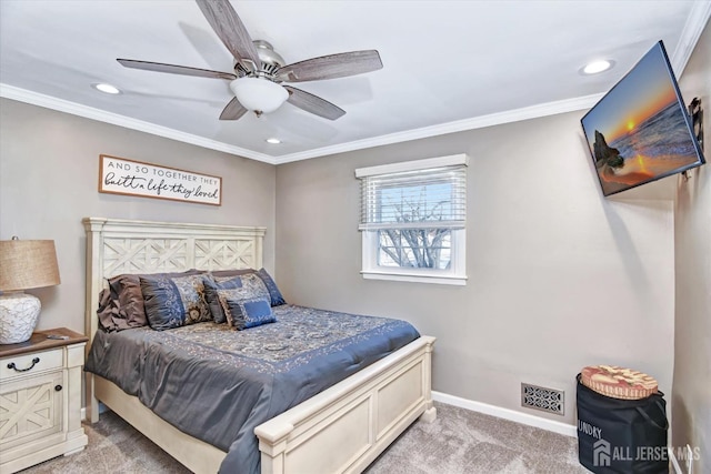 bedroom with ceiling fan, light colored carpet, and crown molding