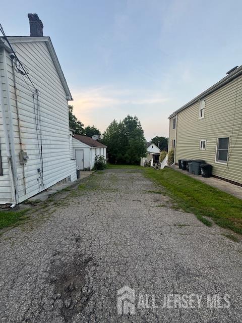 17 Grant St, Dover, NJ 07801 - view of side of property with a chimney