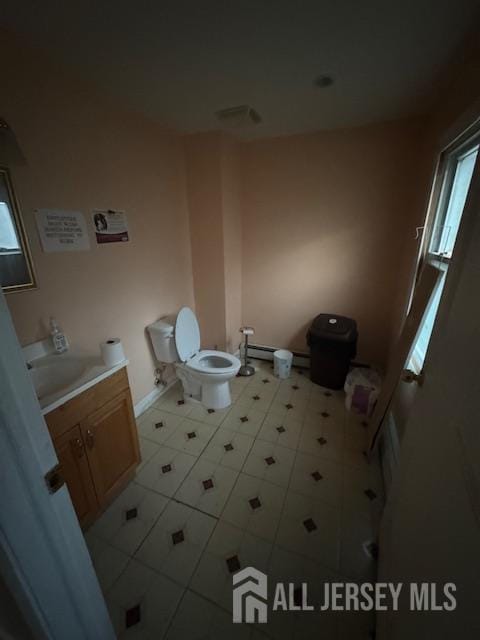 17 Grant St, Dover, NJ 07801 - bathroom featuring vanity, plenty of natural light, and tile patterned floors
