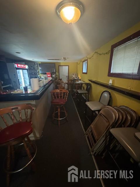 17 Grant St, Dover, NJ 07801 - dining room with a bar