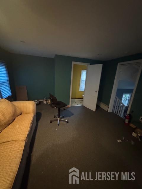 17 Grant St, Dover, NJ 07801 - carpeted living room with healthy amount of natural light